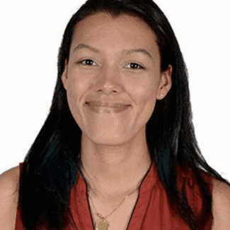 Tamara Fernanda Bonilla Zumbado smiling at the camera against a white background.